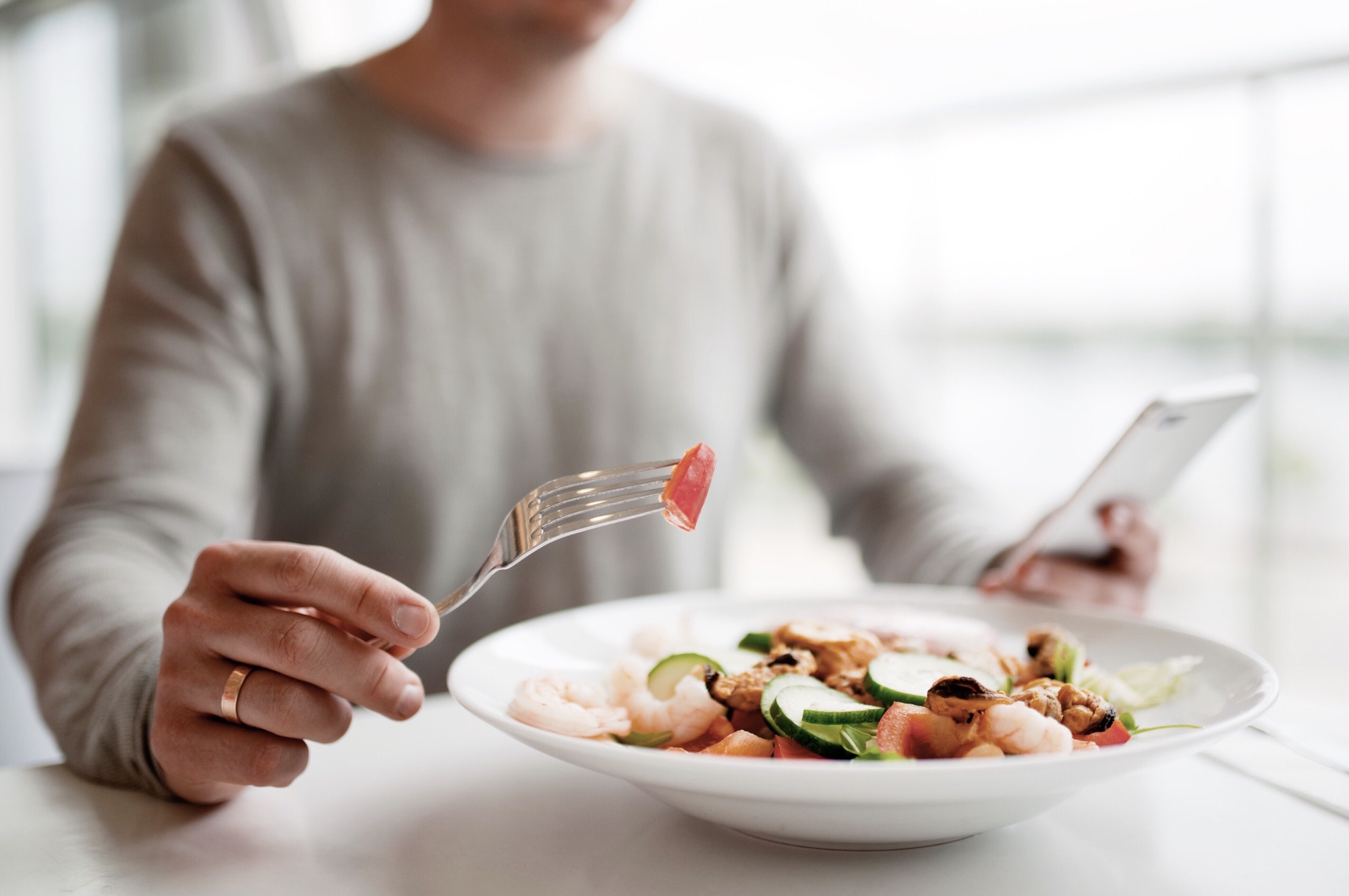 millennial man eats healthy food