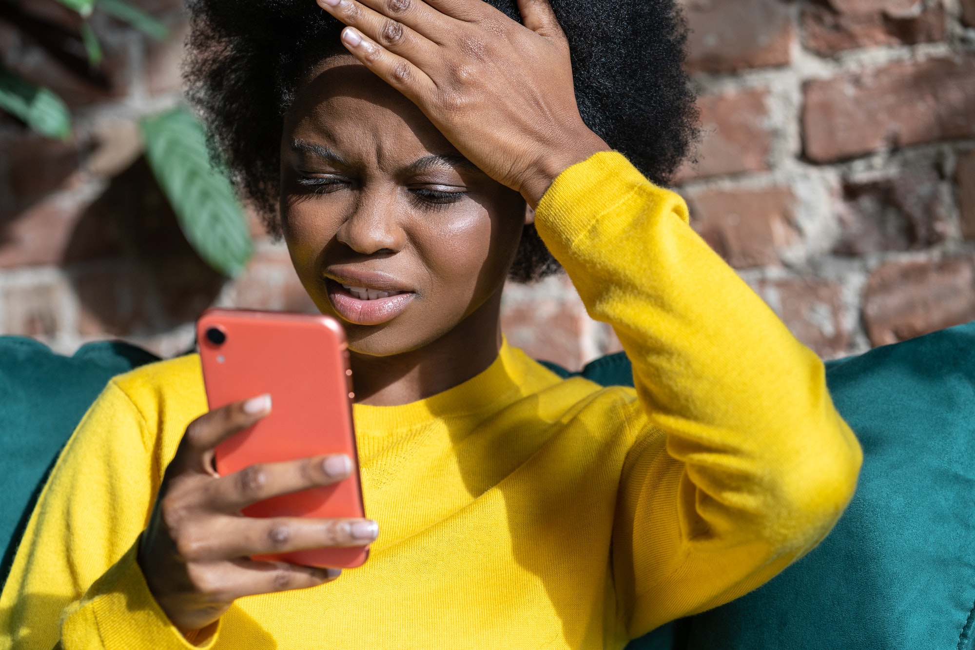 Confused woman doing facepalm gesture, touching head with palm, look at healthy eating info