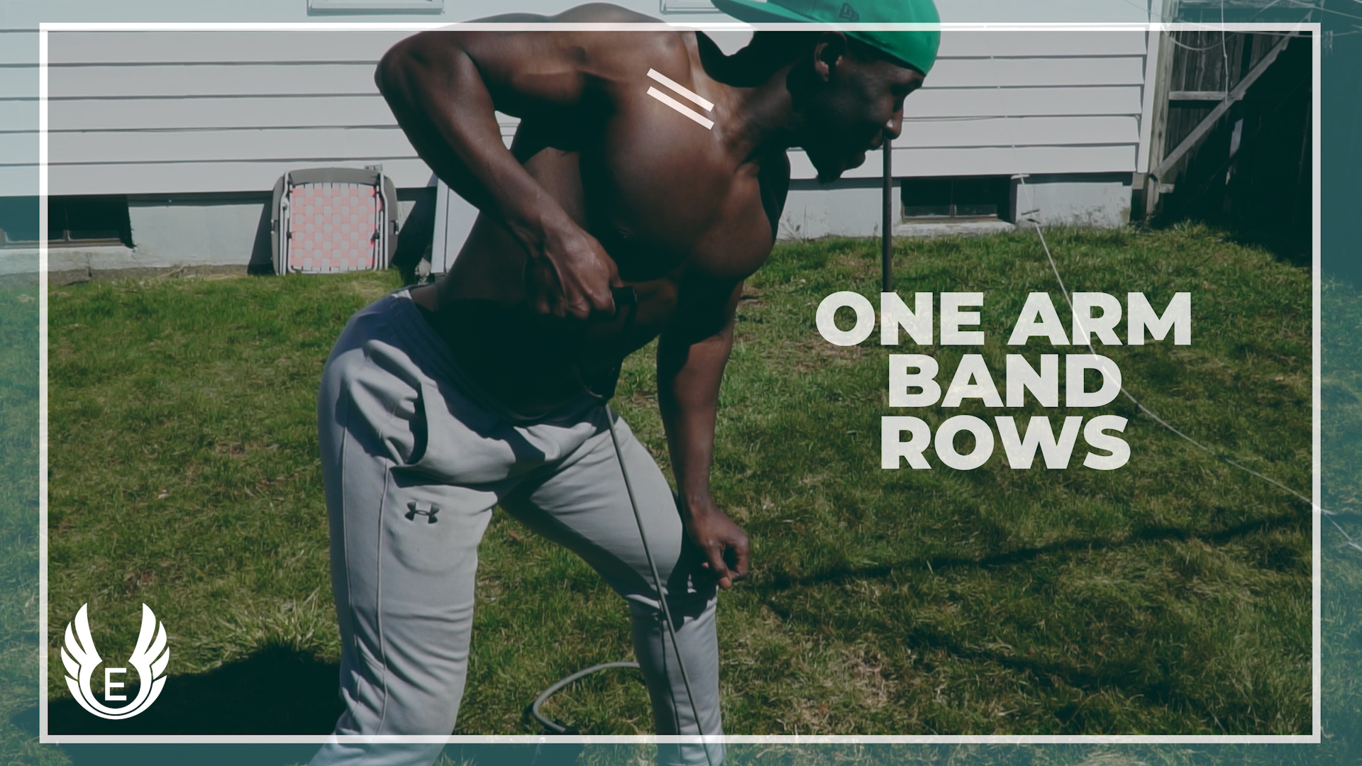 resistance band back workout one arm band rows. back workout at home with bands